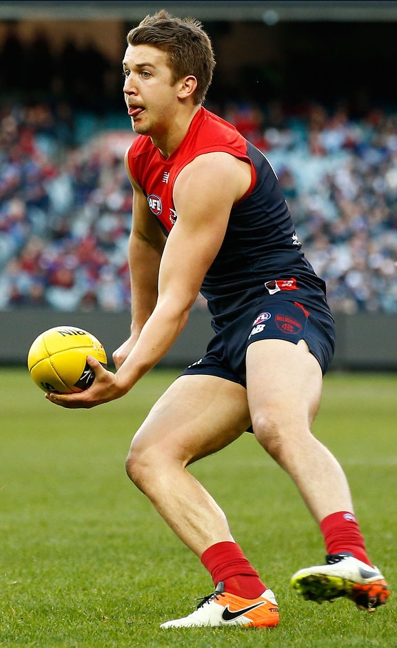 AFL 2016 Rd 12 - Melbourne v Collingwood MELBOURNE, AUSTRALIA - JUNE 13: Jack Trengove of the Demons handpasses the ball during the 2016 AFL Round 12 match between the Melbourne Demons and the Collingwood Magpies at the Melbourne Cricket Ground on June 13, 2016 in Melbourne, Australia. (Photo by Adam Trafford/AFL Media)